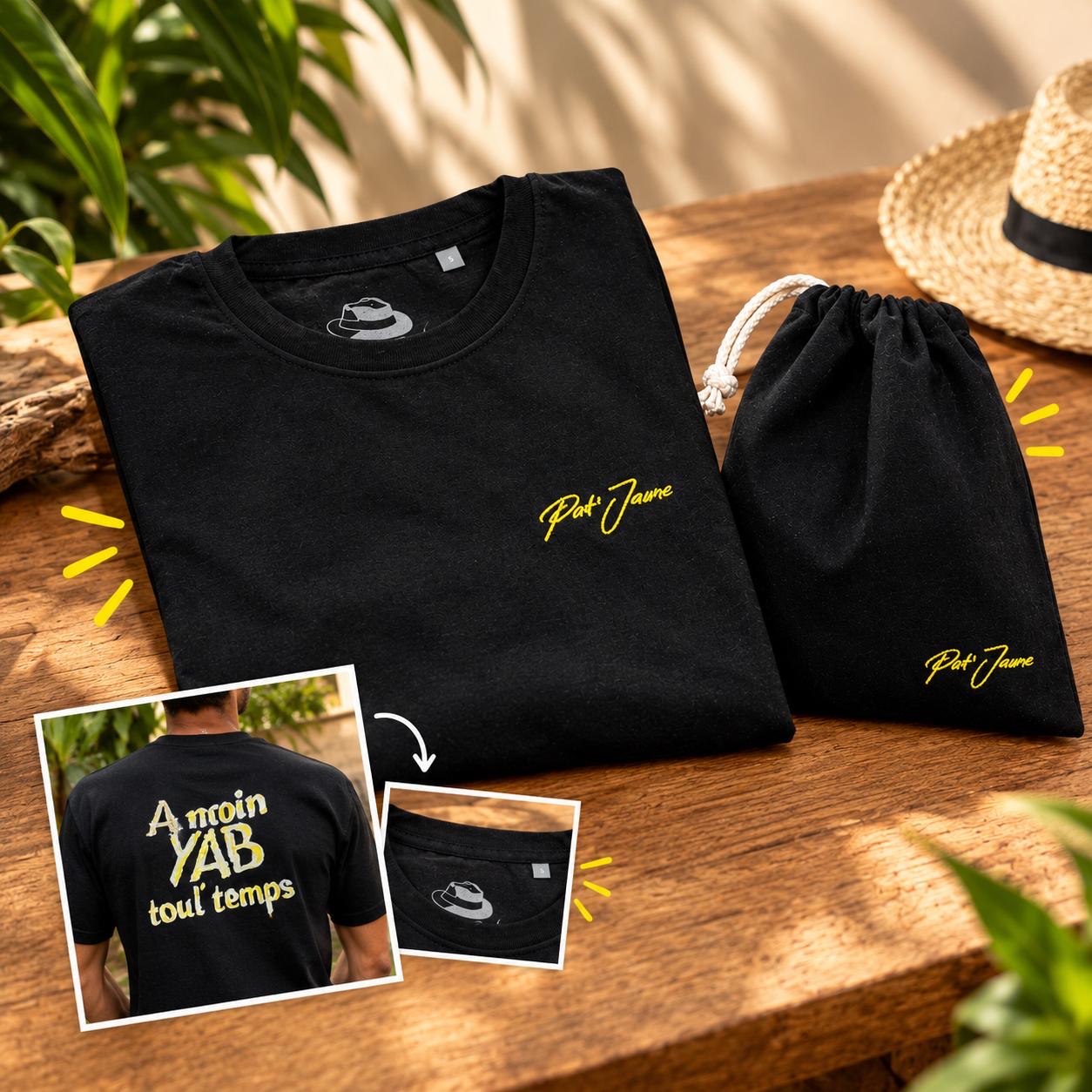 Tee-shirt noir Pat'Jaune plié à côté de son pochon noir, signature Pat'Jaune brodée en jaune ; en médaillon, le dos « A moin YAB toul' temps » et le chapeau imprimé dans le col